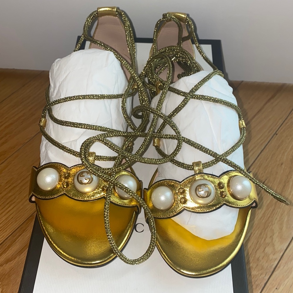 Gucci Women’s tie up gold sandals